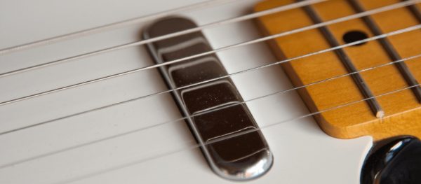 How To Change Guitar Strings The Right Way