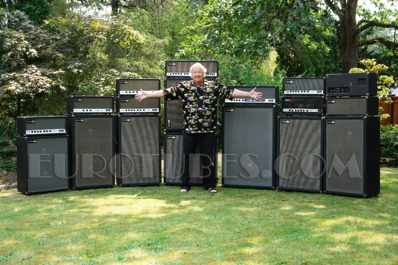 Photo of Conrad Sundholm with a collection of Sunn amps.