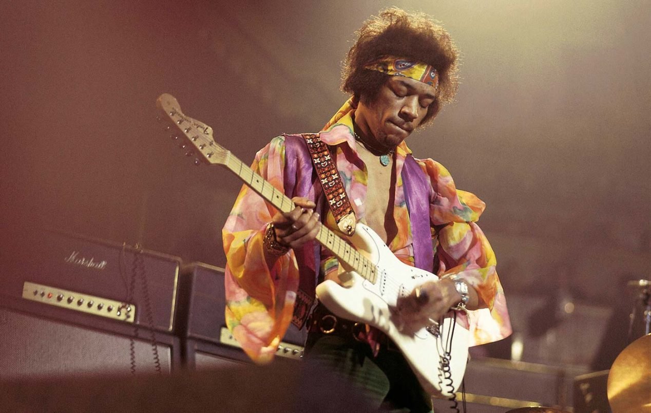 Photograph of Jimi Hendrix on stage with his 1968 stratocaster.
